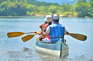 People Paddling a Canoe