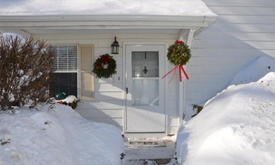 Snow covered door of 55 Pamela Lane Amesbury, MA 01913 Front door of 55 Pamela Lane Amesbury, MA 01913