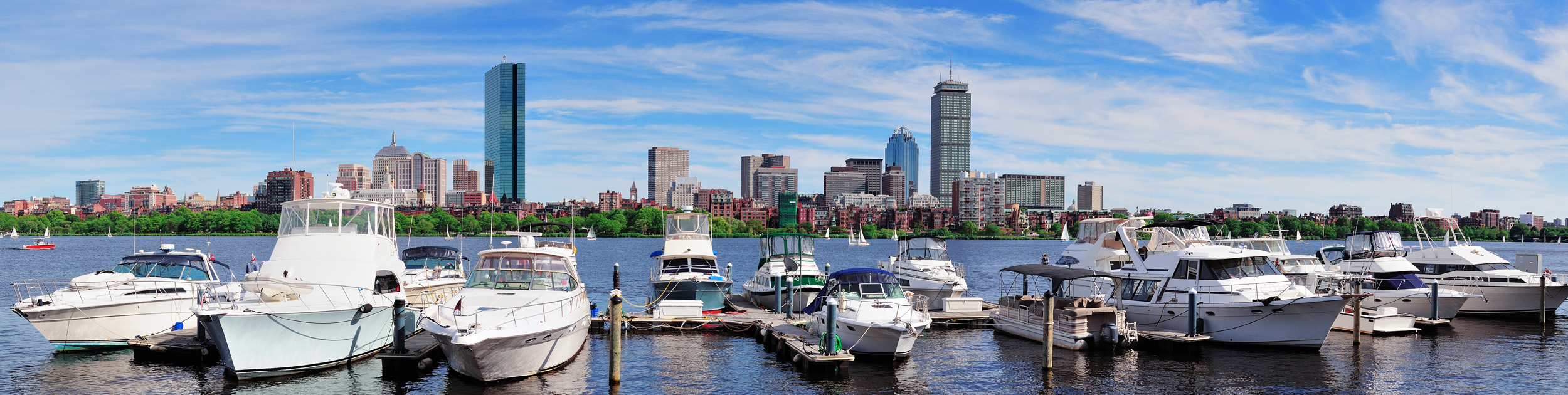 boats in Boston harbor with the city in the background