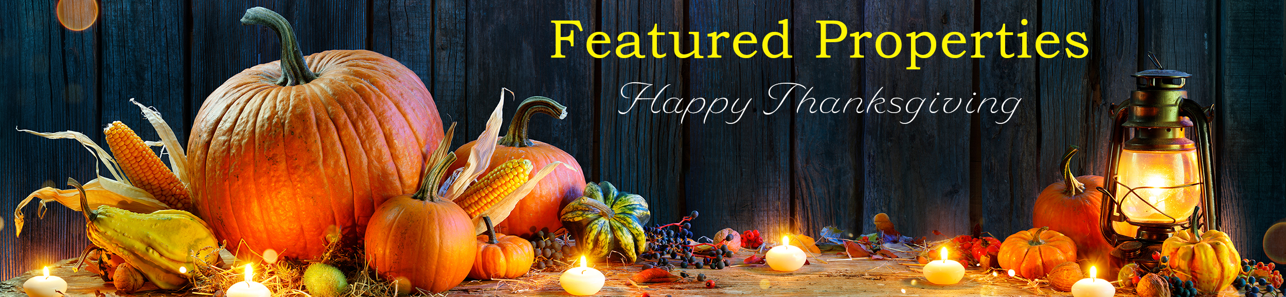 Featured Properties banner for November with a lovely display of pumpkins, corn and squash